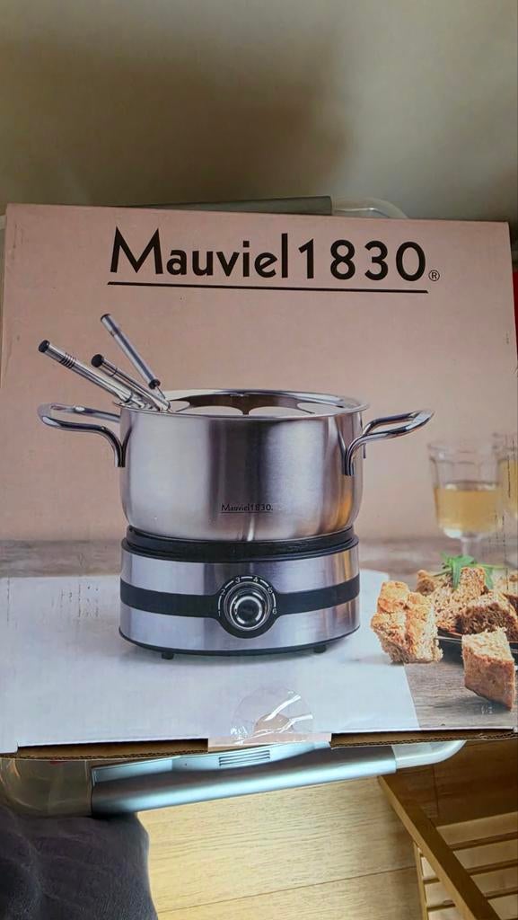 Gloednieuw fonduetoestel, Ophalen