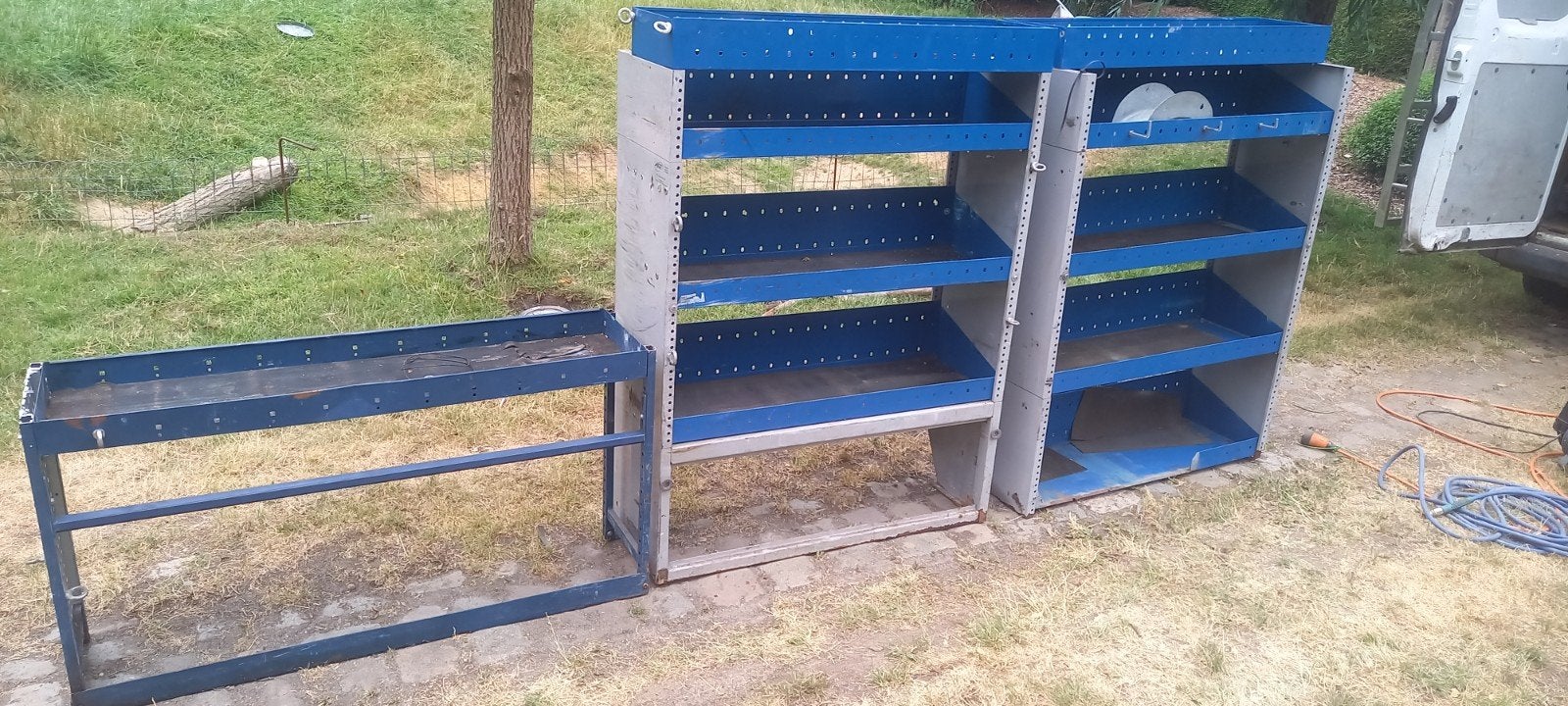 Rekken inrichting camionette of bestelwagen, Ophalen