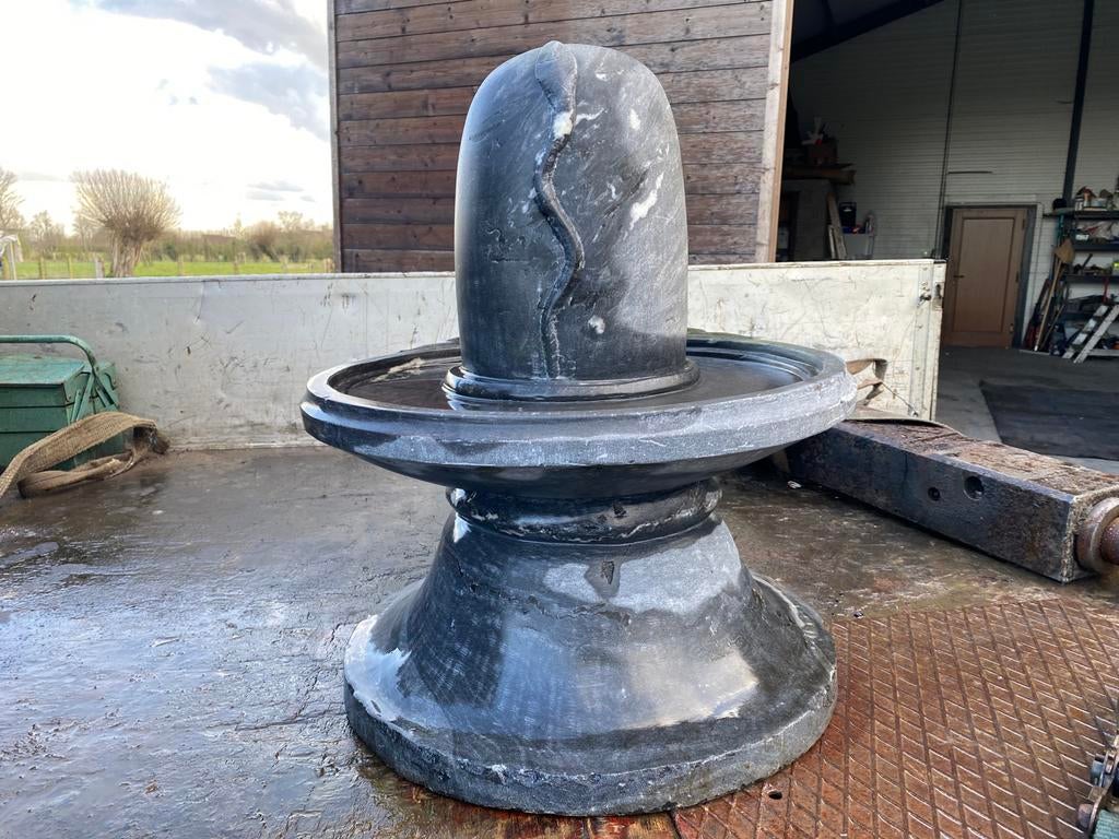 Tuinbeeld in arduin, Ophalen