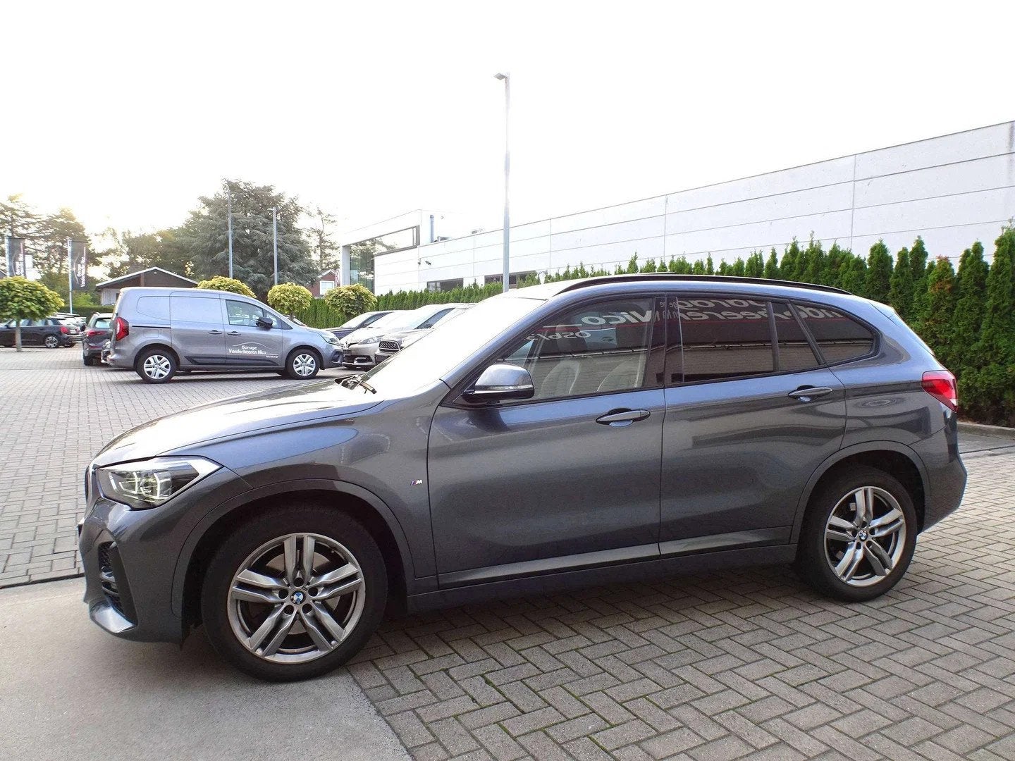 BMW X1 2.0iAS xDrive20 M-PACK,PANODAK,ADAPT. CRUISE,NAVI,M-S, Auto's, 1998 cc, Gebruikt, 131 kW, Bedrijf