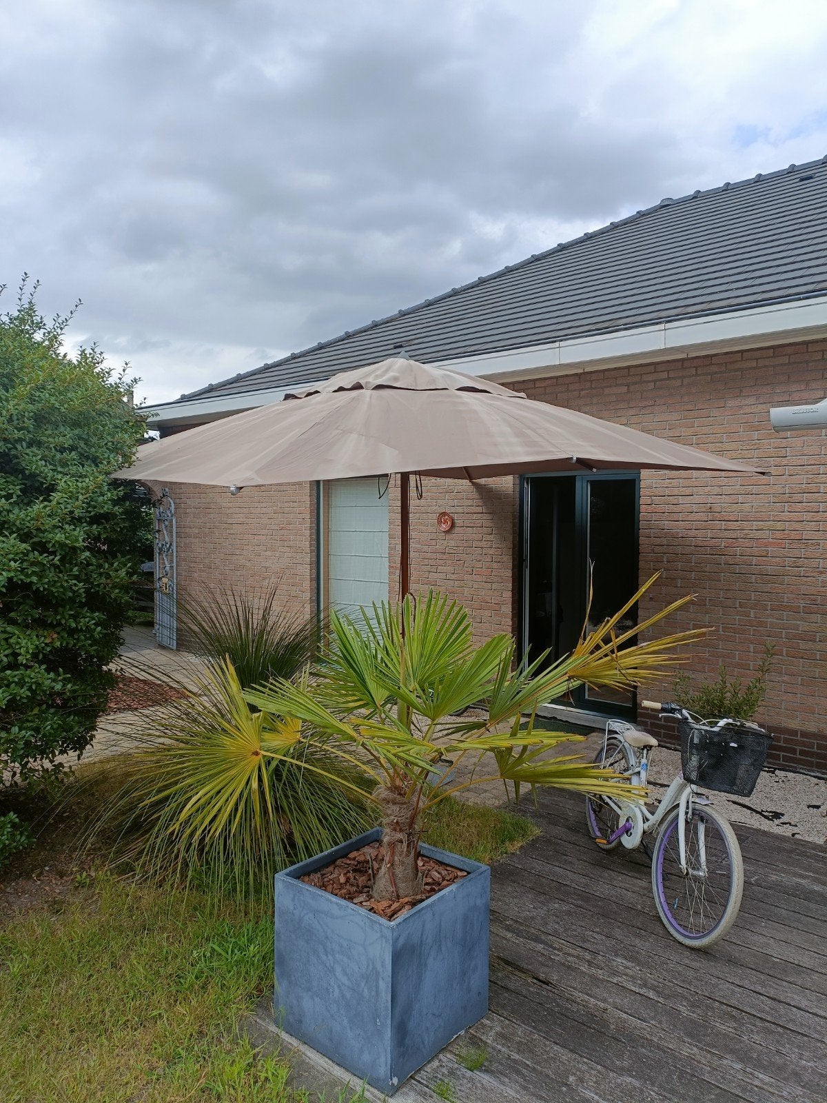 parasol met voet, Ophalen