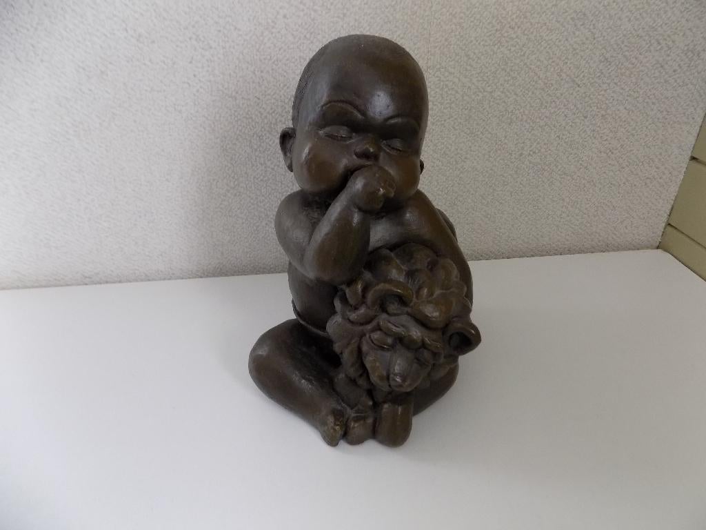 beeldje zittende baby, Ophalen