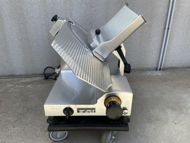 Professionele vleessnijmachine merk OMEGA, Huis en Inrichting, Snijmachine, Ophalen, Gebruikt
