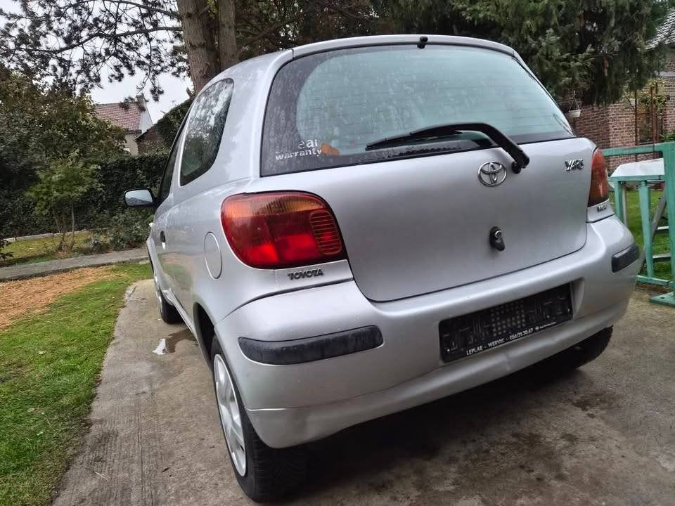Toyota yaris 1000 vvti essence/ climatisation, Auto's, Voorwielaandrijving, Stof, Grijs, Particulier