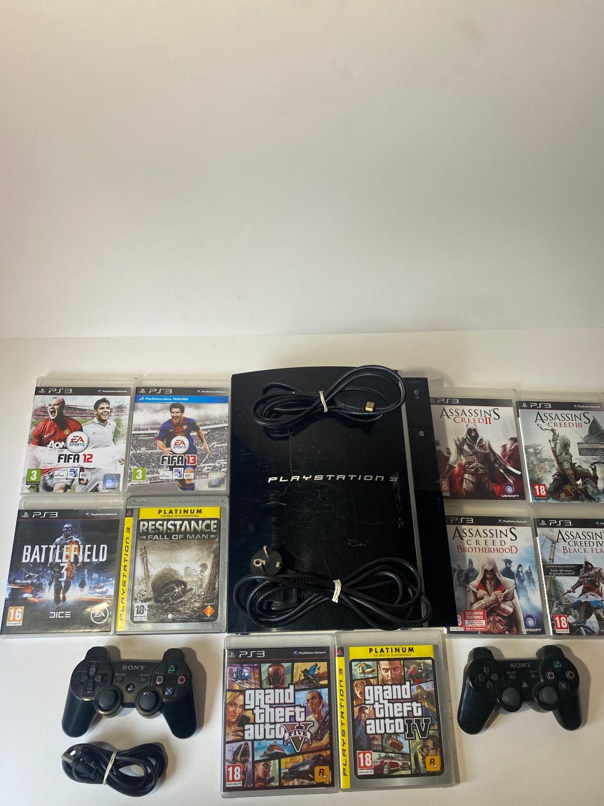 PlayStation 3 Phat avec 2 manettes + 9 jeux (GTA,..), Enlèvement ou Envoi, Comme neuf, Avec 2 manettes, Avec jeux
