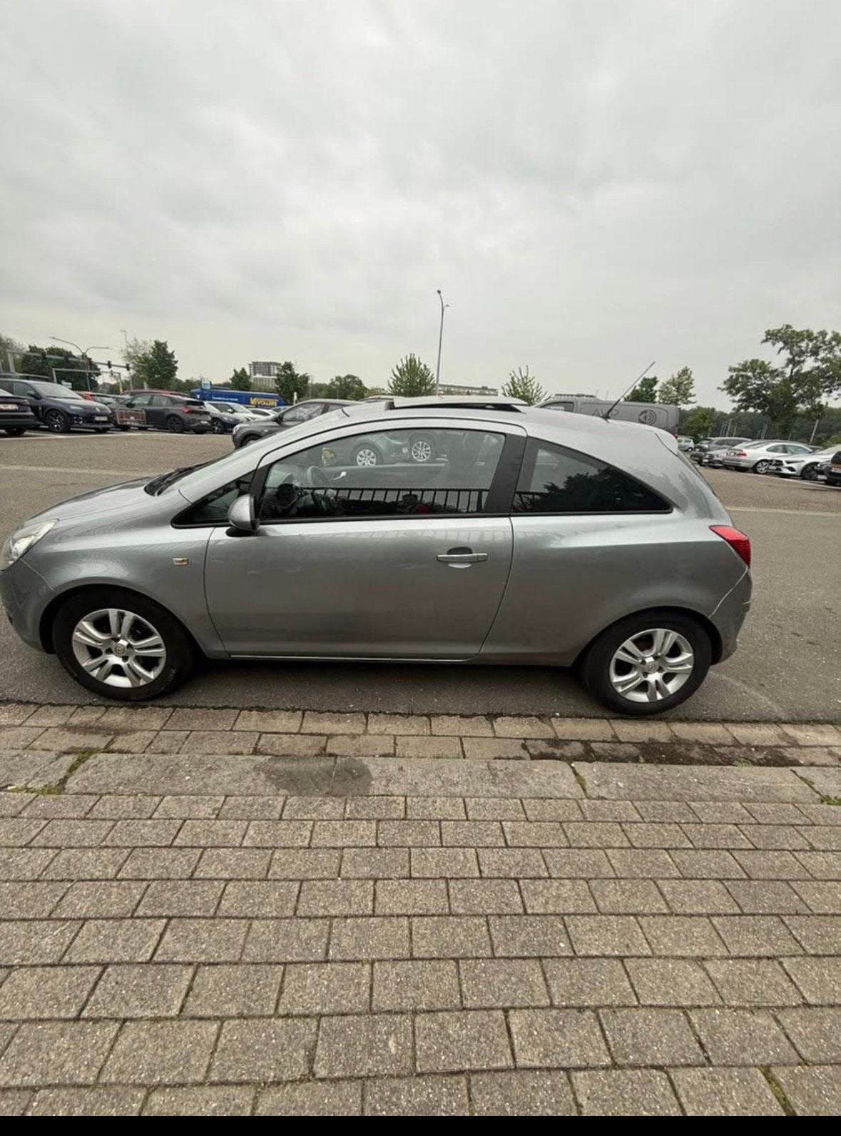 Opel Corsa 2010 1.2 Benzine, Auto's, Blauw, Handgeschakeld, Particulier, Corsa
