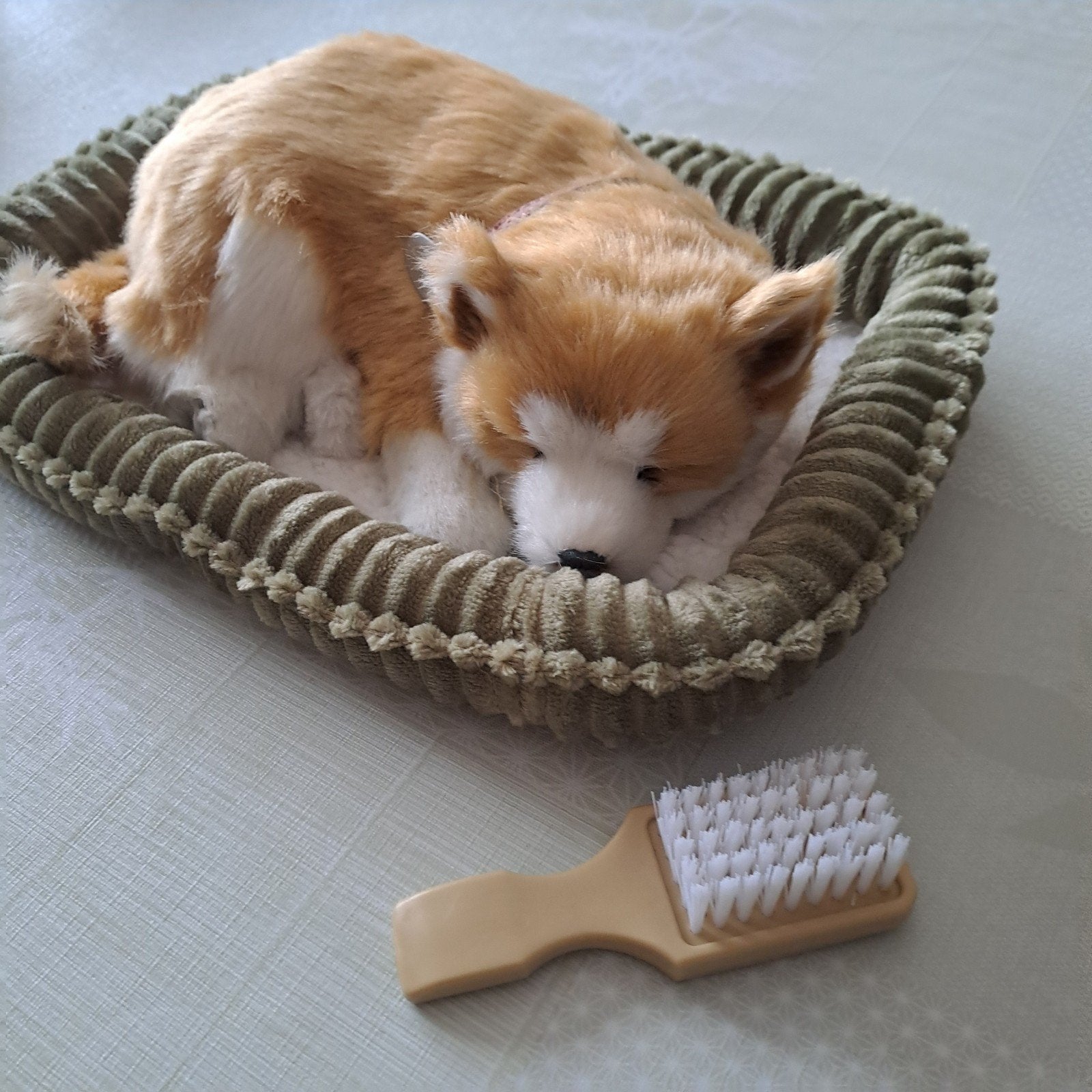 Ademend hondje, Ophalen