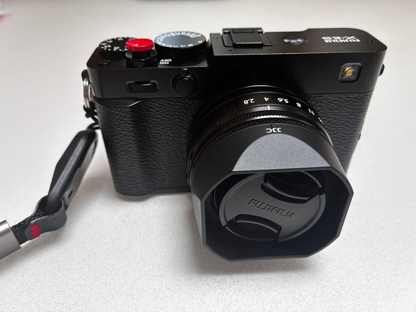 Fujifilm X-E5 + XF 23mm F/2.8 R WR zwart, Moins de 4 fois, Pare-soleil, Comme neuf, Appareil photo hybride