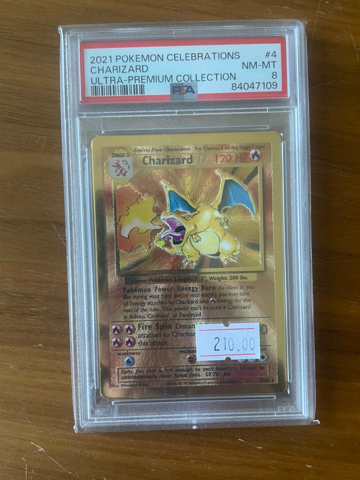 Charizard Celebrations Metal Card PSA 8, Ophalen of Verzenden, Zo goed als nieuw