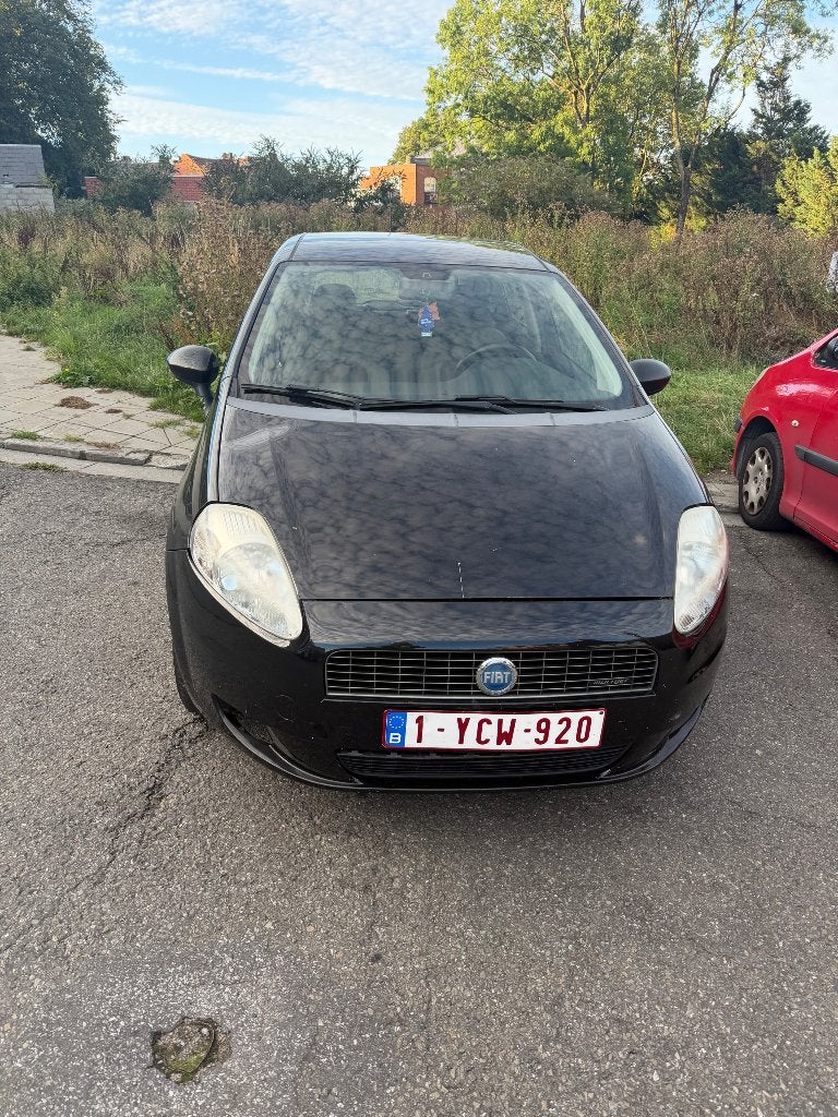 Fiante grande punto 1400 diesel, Auto's, Automaat, Stof, Elektrische ramen, 4 cilinders