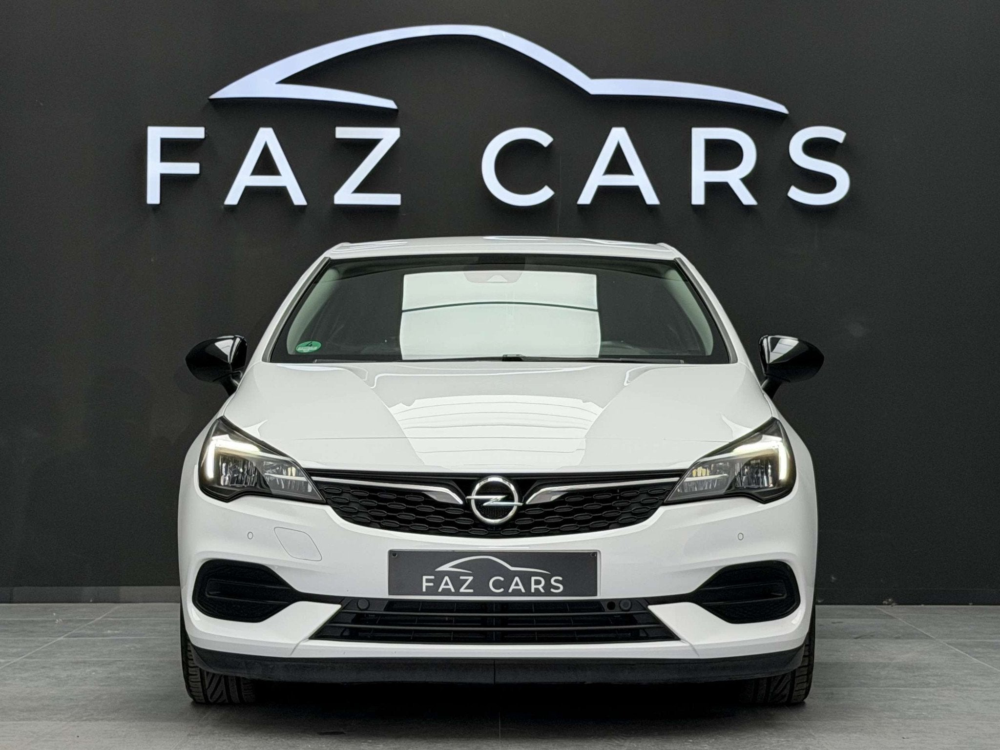 Opel Astra 1.2 Turbo Edition * 1ER PROP + CAMÉRA + GARANTIE, Auto's, Opel, Voorwielaandrijving, Lichtsensor, Stof, Gebruikt