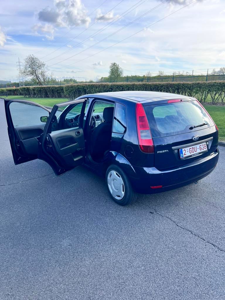 Ford fiesta 2006  1,25l benzine, Auto's, Zwart, 4 cilinders, 65 kW, Blauw