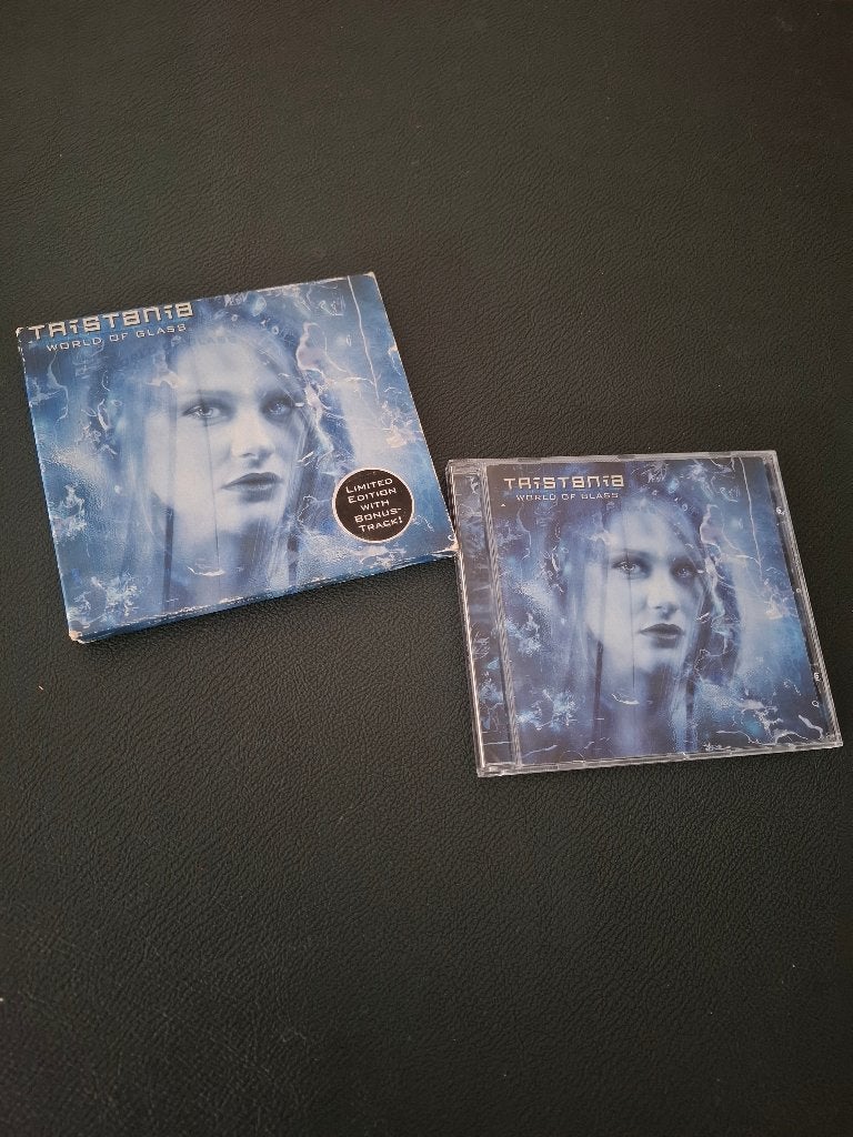 Tristania cd World of Glass, Cd's en Dvd's, Cd's | Hardrock en Metal, Gebruikt, Met bonustracks, Ophalen of Verzenden, Album
