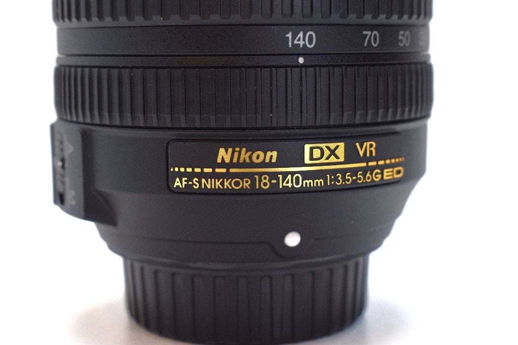Objectif Nikon TOP 18-140 mm 3,5-5,6G ED DX VR AF-S, Enlèvement ou Envoi, Utilisé, Nikon, Bouchons d'objectif