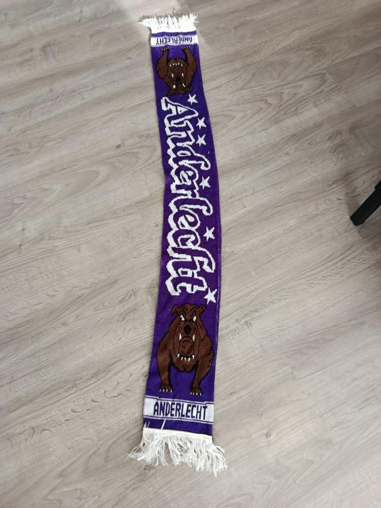 Paarse sjaal Anderlecht, Ophalen