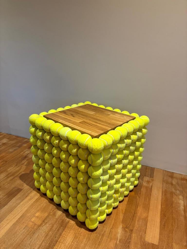 Upcycled design van oude tennis- en padelballen, Ophalen