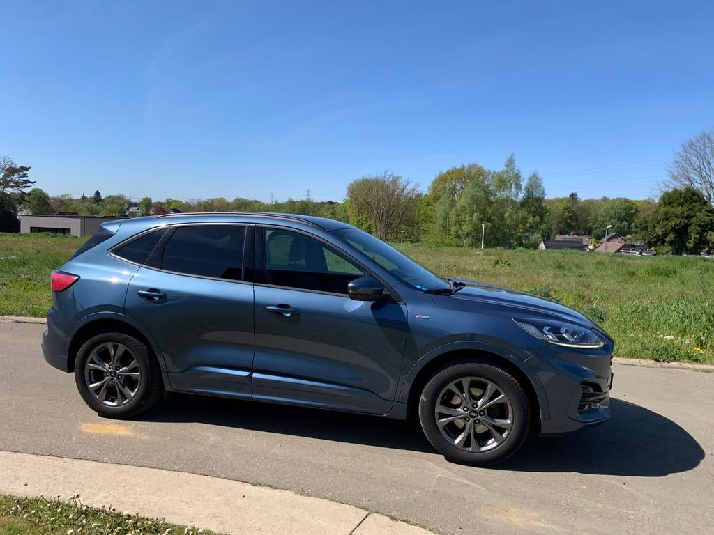 Kuga 1.5 st line 150 pk benz sportpak uitvoering model 2020, Auto's, Ford, Voorwielaandrijving, 1489 cc, 4 cilinders, Blauw