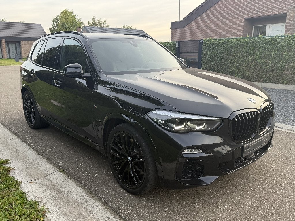 BMW X5 xDrive45e M Sport Automaat | 22"  | 1 Jaar Garantie, Automaat, Dealer onderhouden, 27 g/km, Zwart