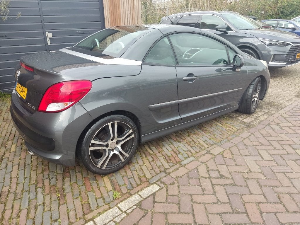 Peugeot 207 Cabrio (Vuile cilinderkoppen), Auto's, Voorwielaandrijving, Euro 5, Stof, Cabriolet