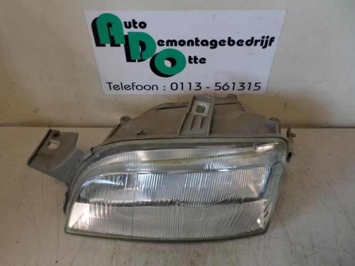 Phare gauche d'un Fiat Punto (Punto 94-), -, 3 mois de garantie, Utilisé, Fiat