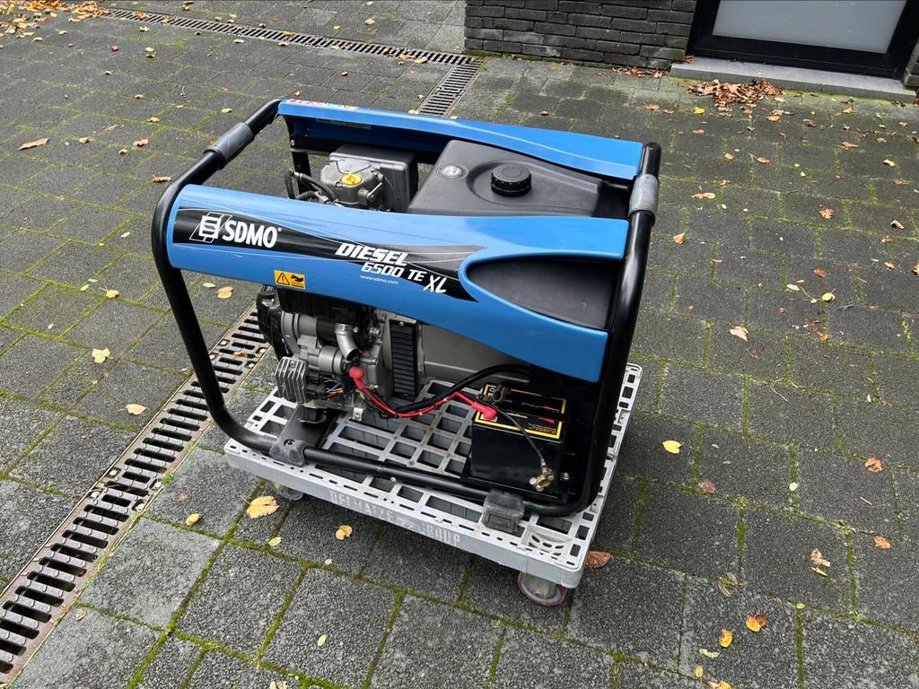 SDMO Diesel 6500 TE XL, Doe-het-zelf en Bouw, Aggregaten, Ophalen, Elektrisch startend, Dieselolie, Zo goed als nieuw
