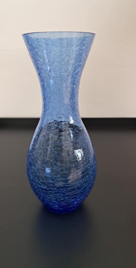 vase bleu craquelé, Enlèvement