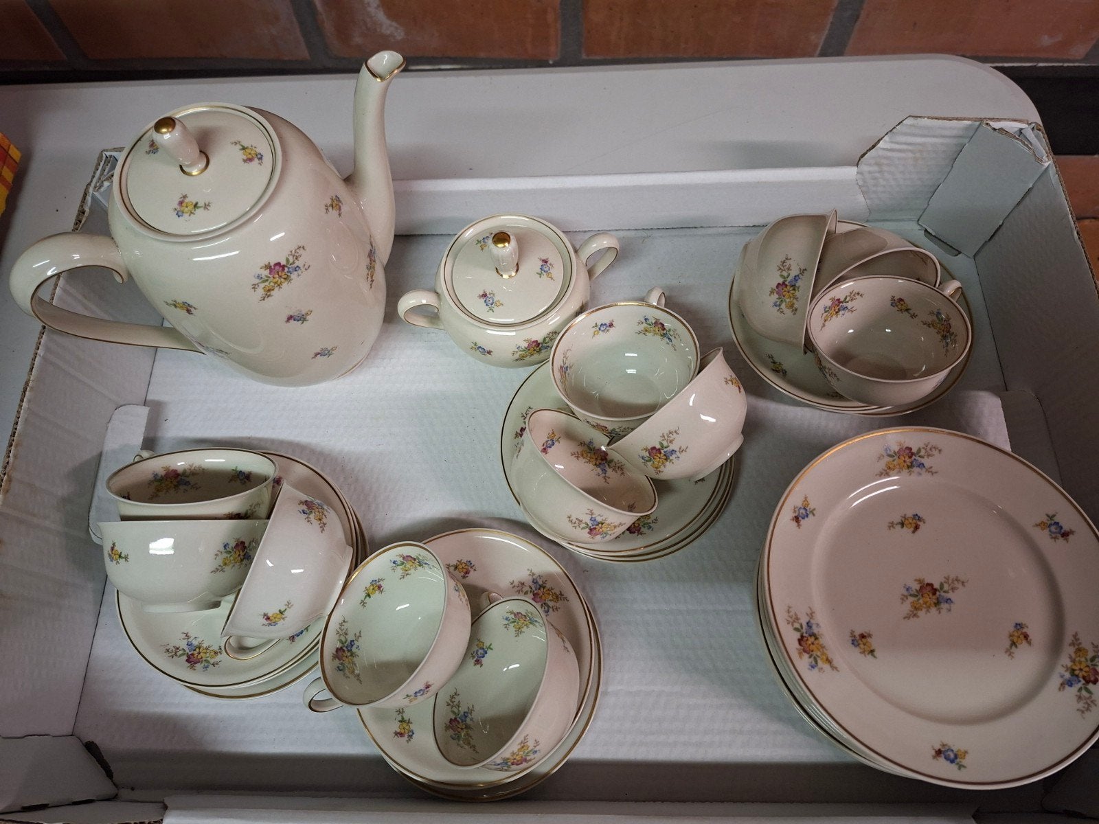 porseleinen servies, Ophalen