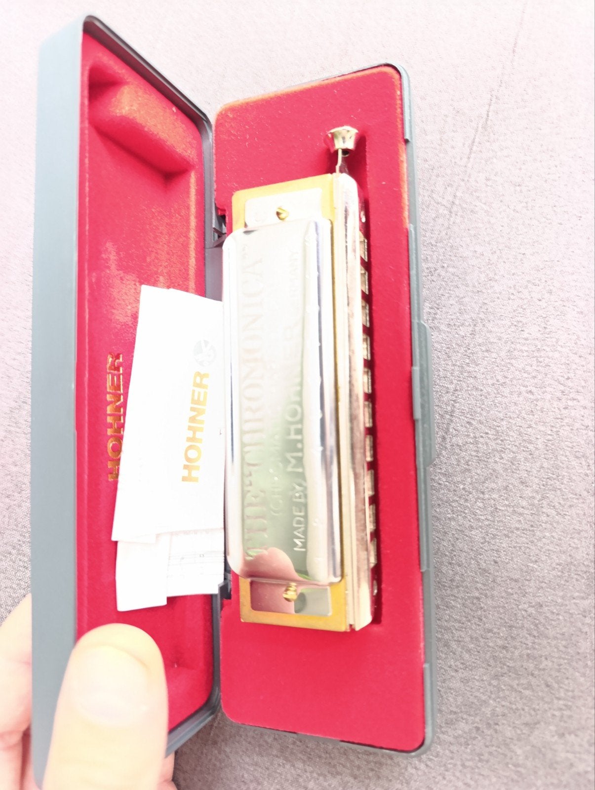 Mondharmonica M. Hohner, Ophalen