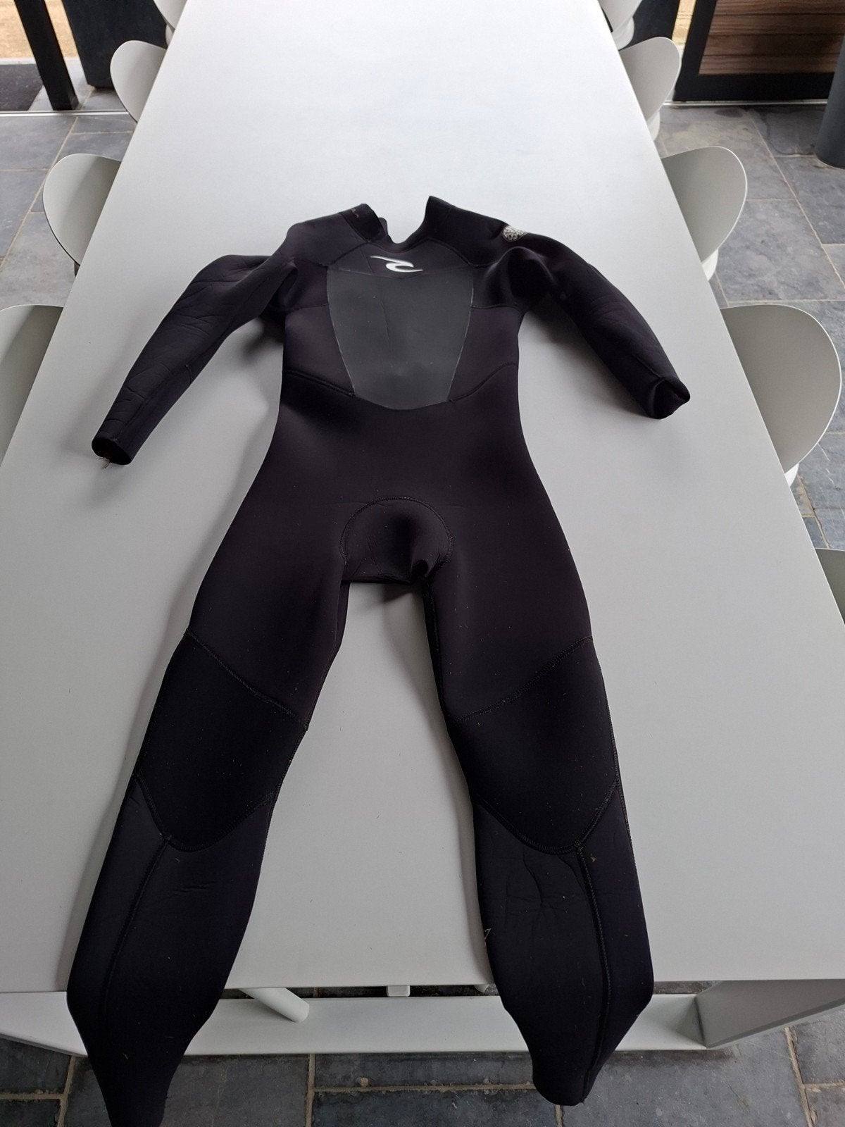 wetsuit Ripcrul, Ophalen