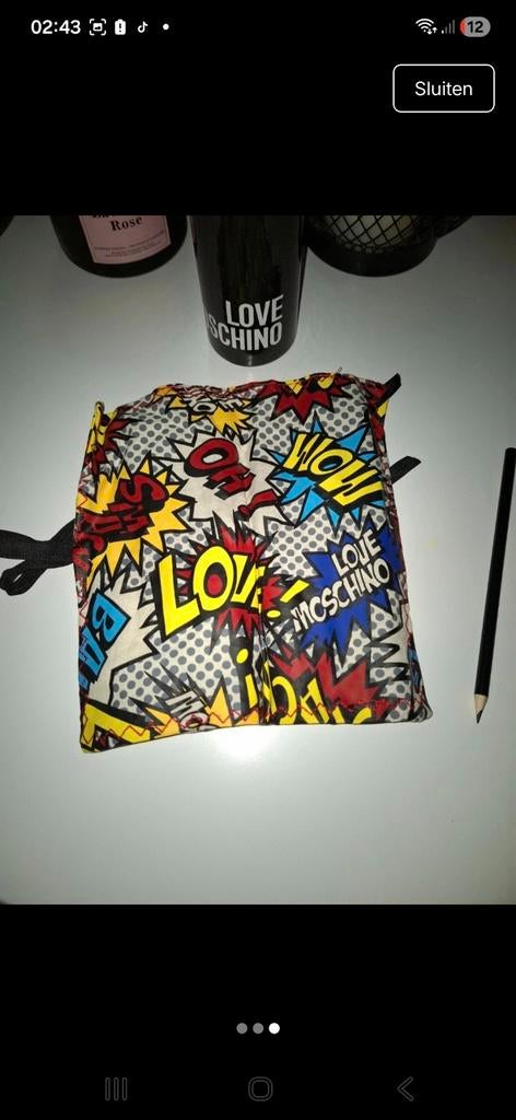 Love MOSCHINO  roletui met de originele koker(collecteritem)