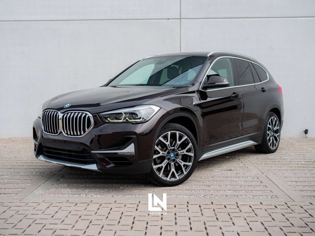BMW X1 PHEV 1.5iA xDrive25e | 1J Garantie | Achteruitrijc, Auto's, Gebruikt, Bruin, 1820 kg, Leder