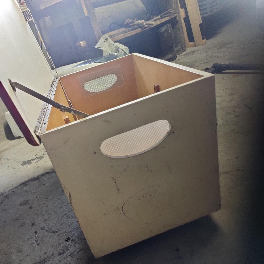 Houten speelbak, Ophalen