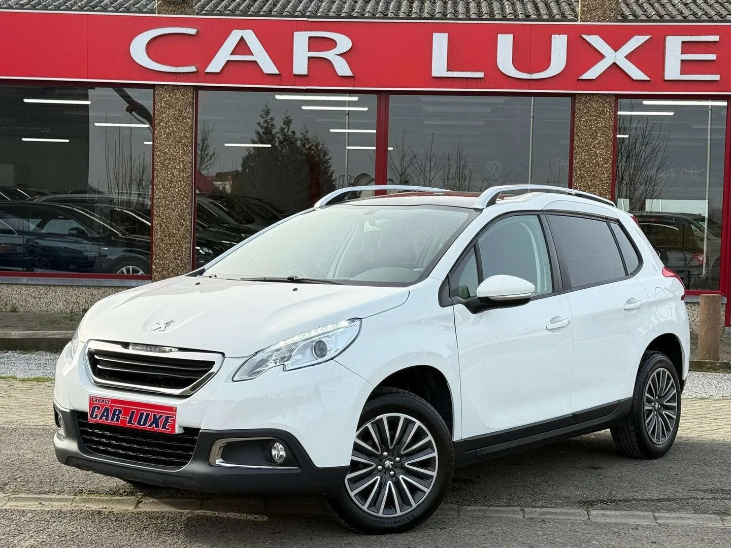Peugeot 2008 1.2 PureTech (bj 2014), Auto's, https://public.car-pass.be/vhr/129dbc53-f482-4637-8d83-e483faedd8a0, Stof, Gebruikt