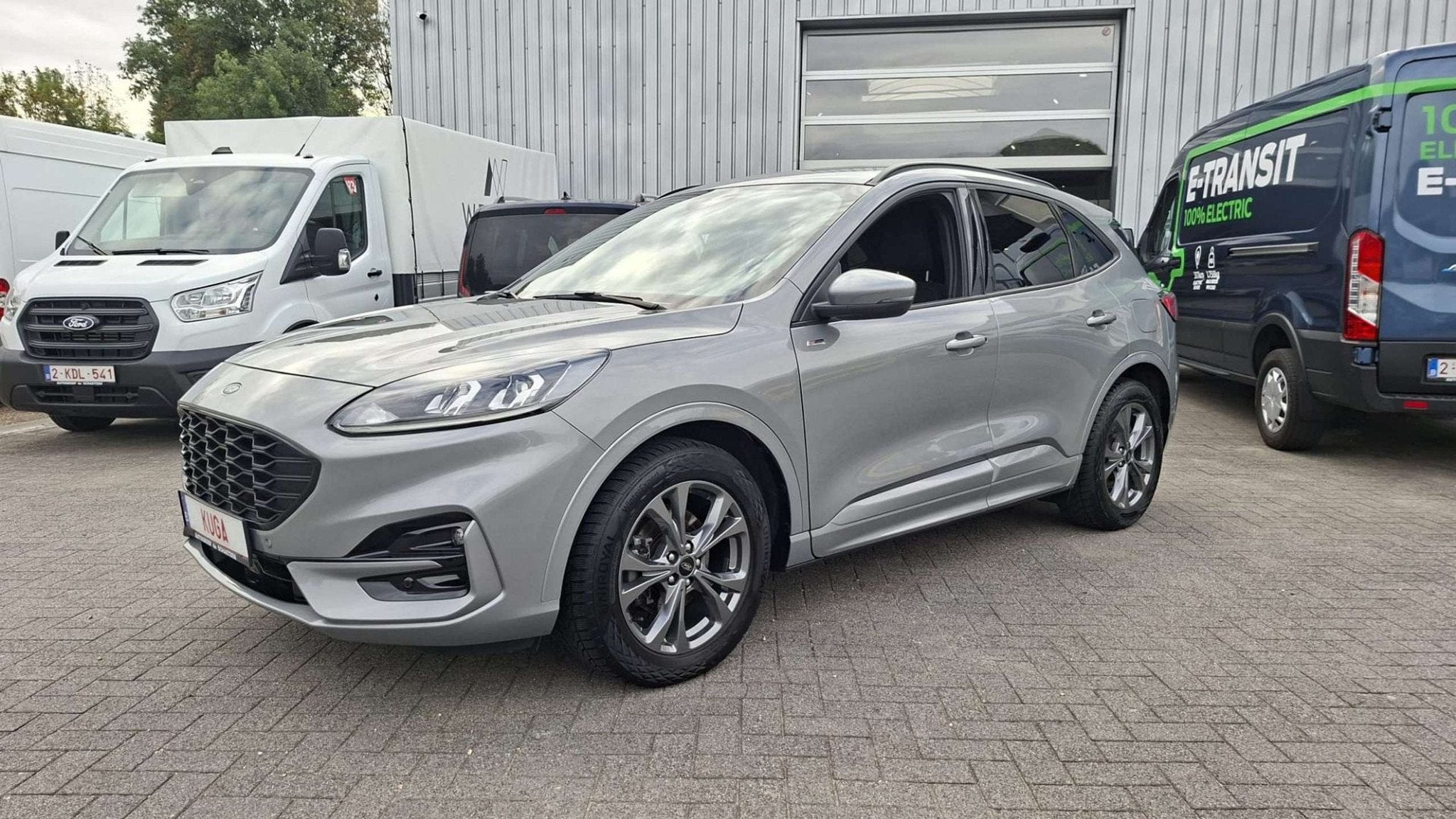 Ford Kuga ST-Line 2.5 FHEV (bj 2023, automaat), Auto's, Automaat, Stof, Parkeersensor, Bedrijf