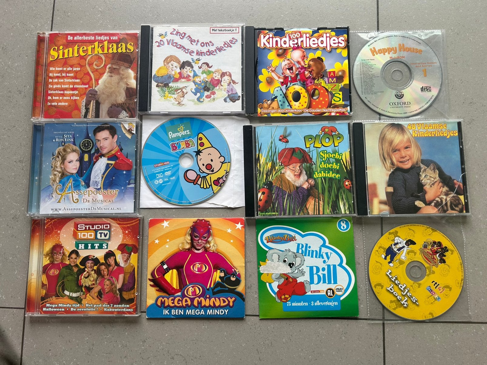 Lot van 11 kinder-CD's en DVD's (Studio 100, Sinterklaas, K3, Enlèvement, Utilisé