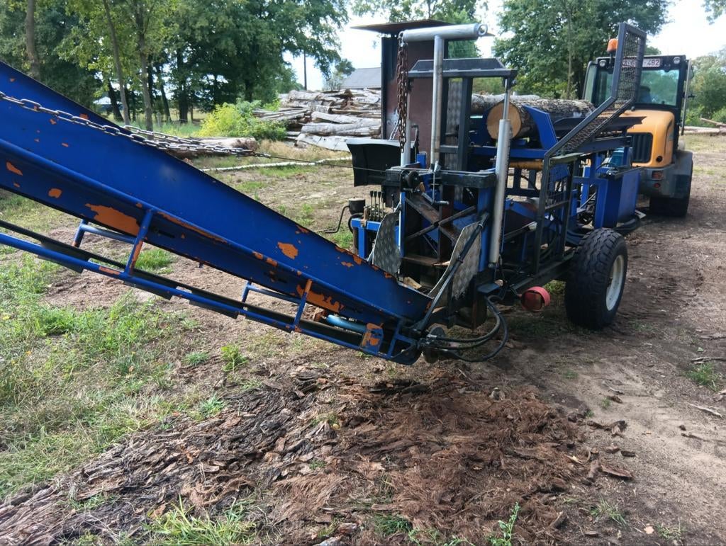 Zaag klief machine brandhout automaat, Ophalen