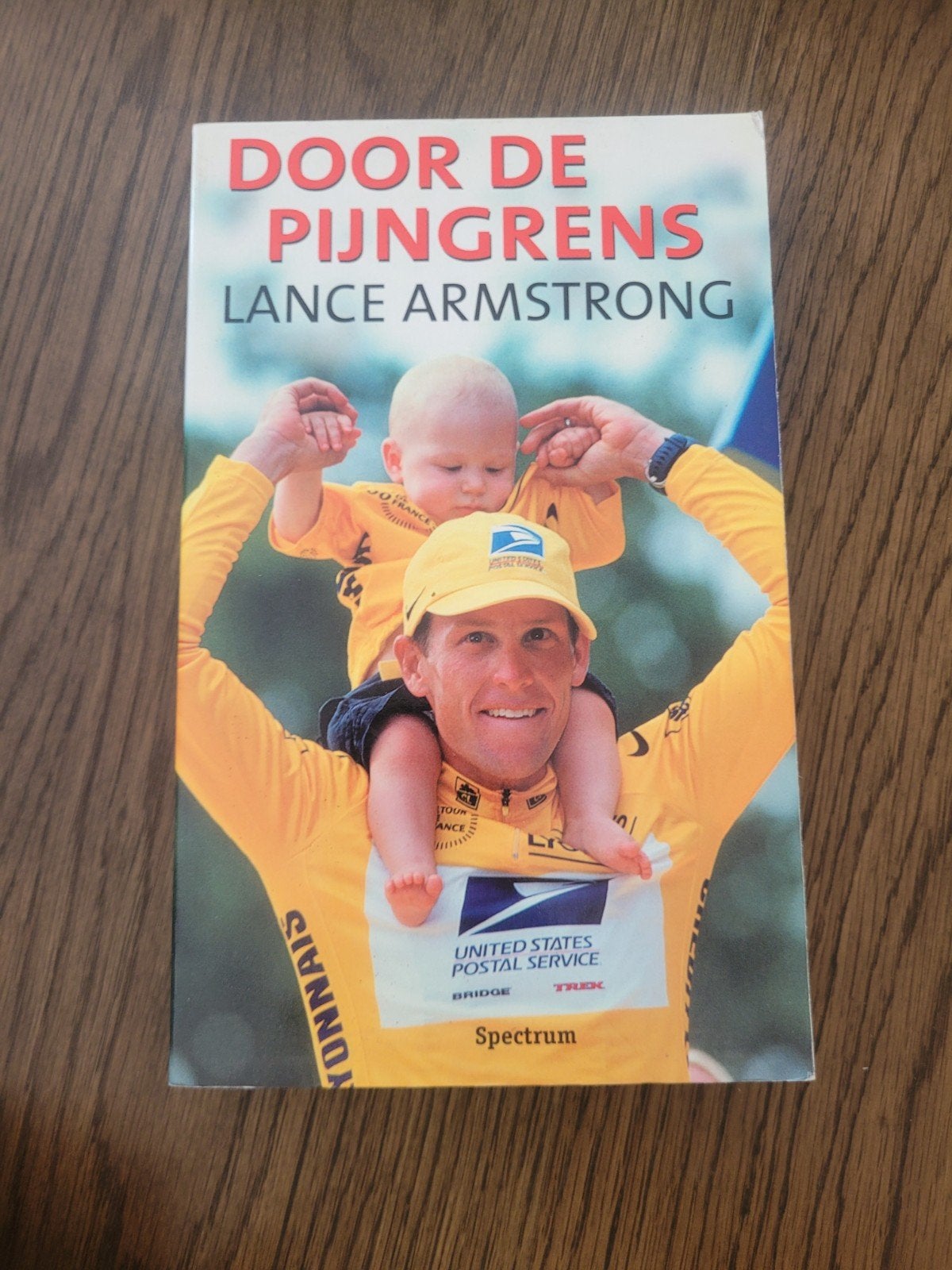 boek door de pijngrens lance armstrong, Ophalen of Verzenden