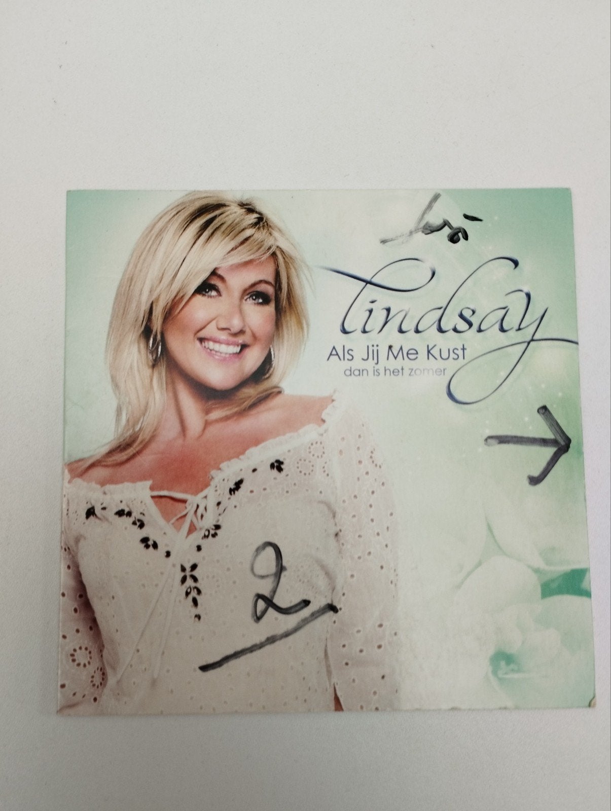 Een klein muziek single van Lindsay kleur verschillende kleu, Ophalen