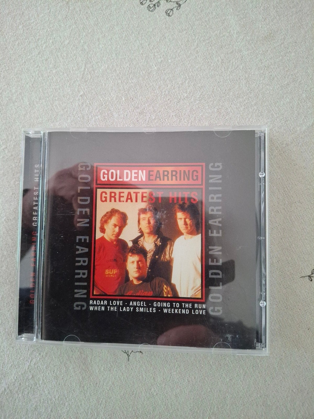 Boucle d'oreille en or CD Greatest Hits, Enlèvement ou Envoi
