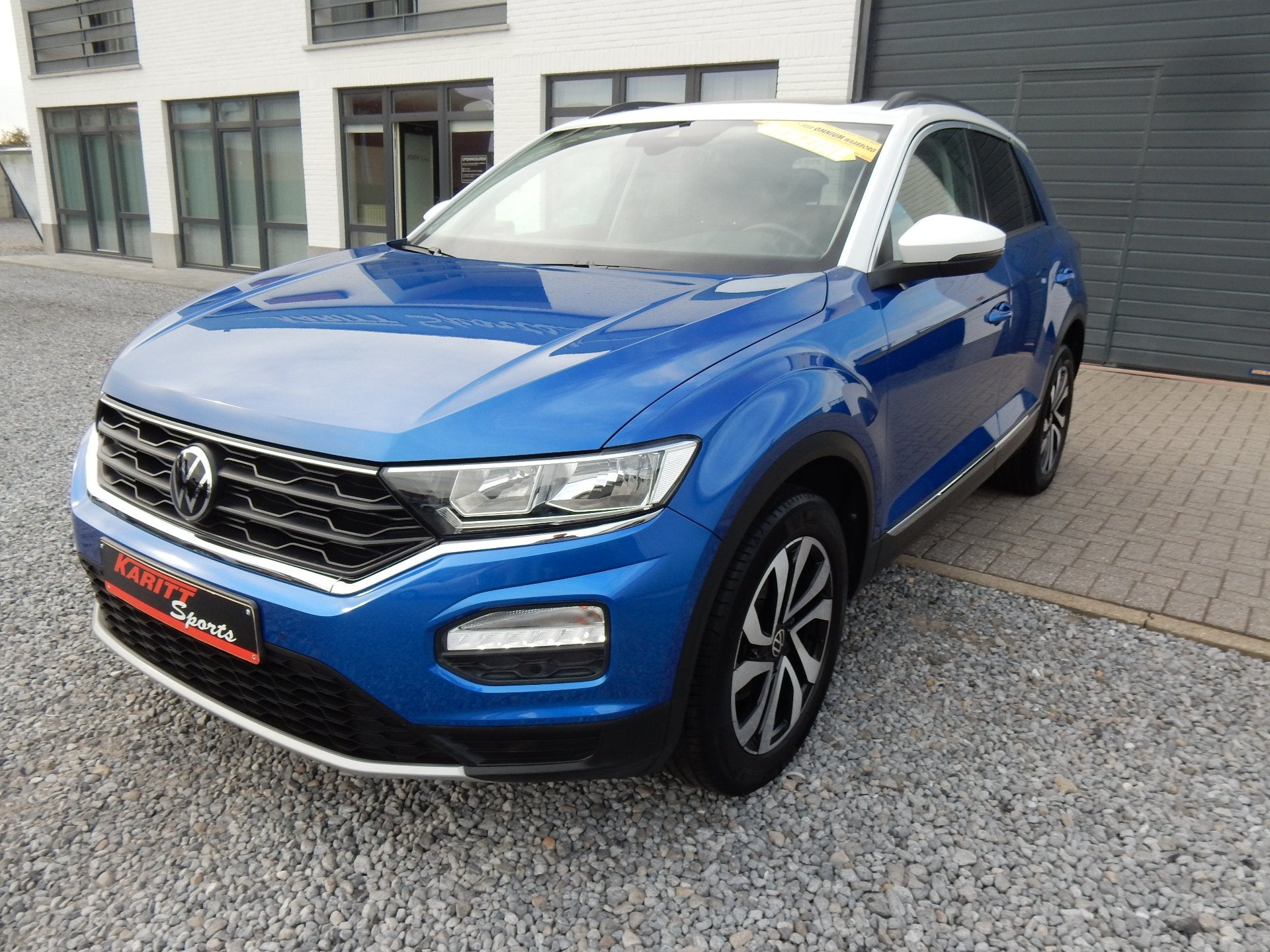 Volkswagen T-Roc TSI Style 150pk Trekhaak / pano-dak /camera, Auto's, Stof, Gebruikt, Overige kleuren, Adaptive Cruise Control