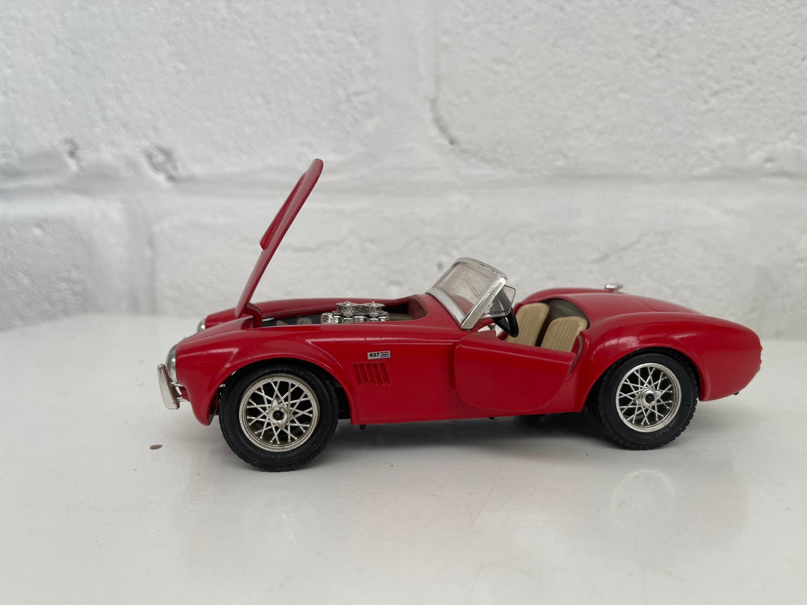 Bburago 1:24 AC Cobra 427 (1965) — Métaux rouges, Enlèvement ou Envoi, Comme neuf