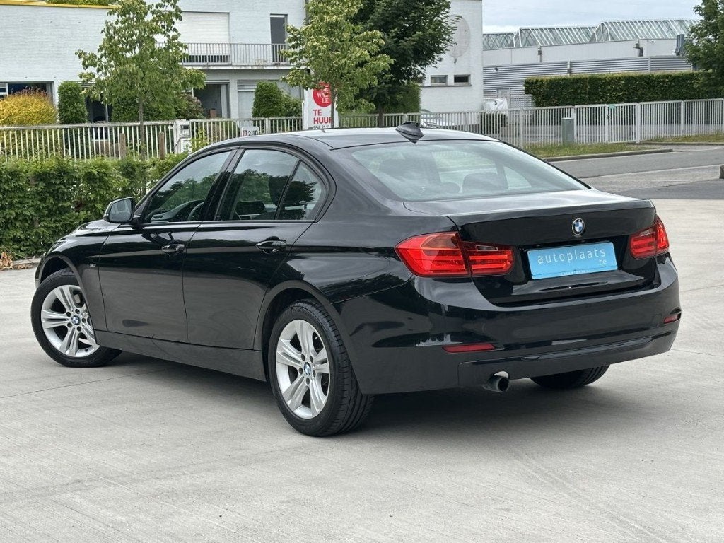 BMW 316i Berline Sport Line 66372km Eerste eigenaar, Auto's, BMW, 100 kW, Dealer onderhouden, Start-stop-systeem, Zwart