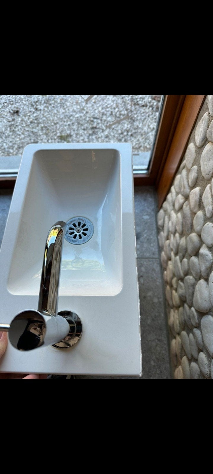 Kleine wc lavabo, Ophalen