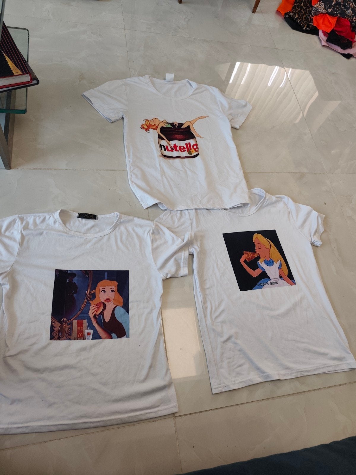 3 t-shirts humoristiques. Cendrillon et fée clochette T. M/L, Manches courtes, Taille 38/40 (M), Enlèvement ou Envoi, Comme neuf