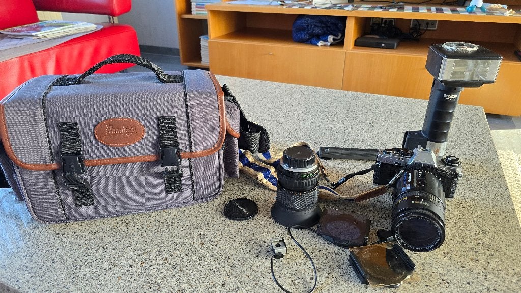 Olympus OM-10 – compleet met lenzen, Metz-flitser en fototas, Ophalen of Verzenden, Gebruikt, Spiegelreflex, Olympus