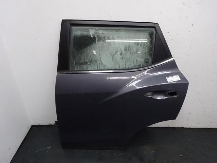 Portière 4portes arrière gauche d'un Ssang Yong Tivoli (AC, -, 3 mois de garantie, Utilisé, SsangYong