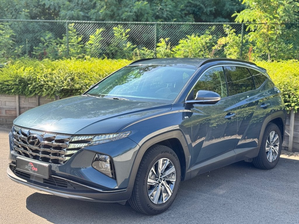 HYUNDAI TUCSON 1.6 GARANTIE - 12 MAAND (EN), Auto's, Hyundai, Stof, 4 cilinders, Blauw, 5 zetels