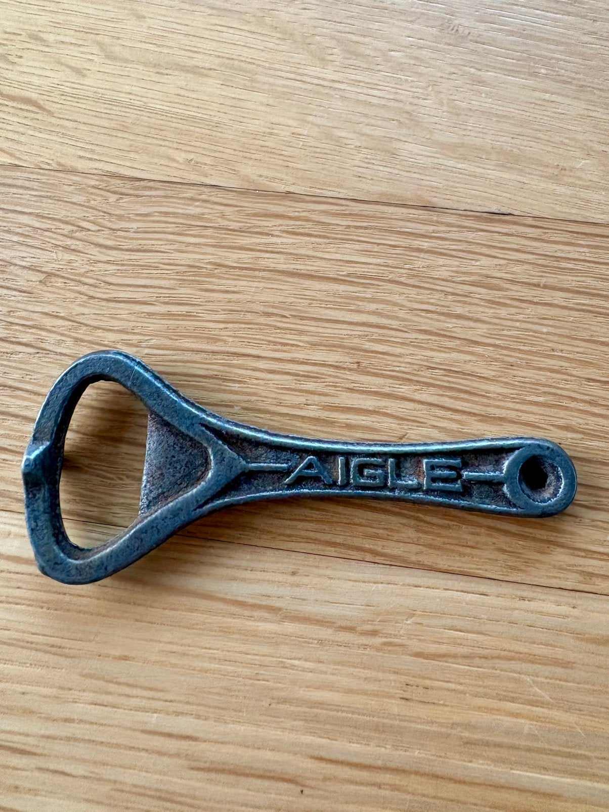 Heel oude flesopener van Aigle Belgica, Ophalen, Gebruikt, Flesopener, Overige merken