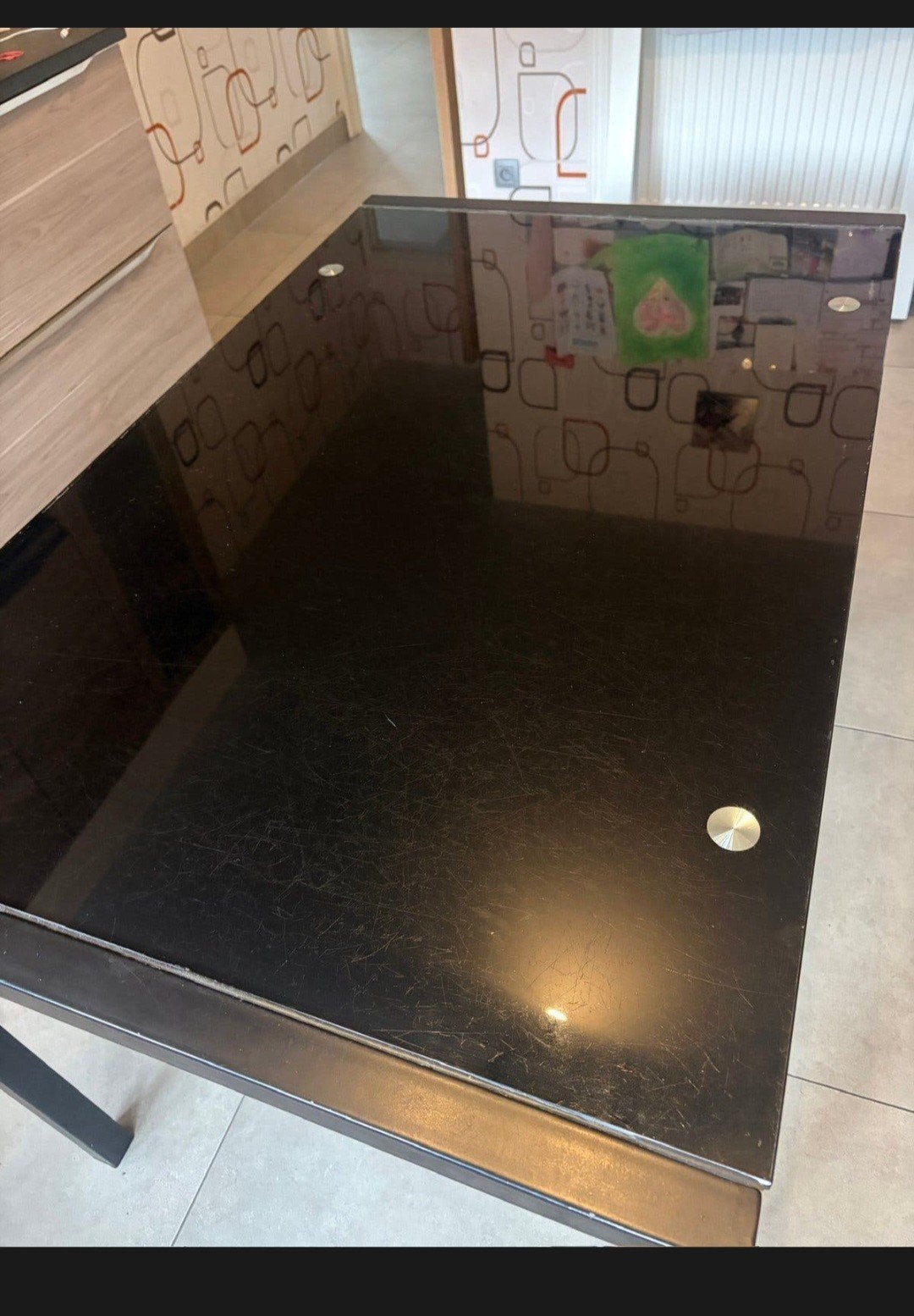 glazen keukentafel, Ophalen