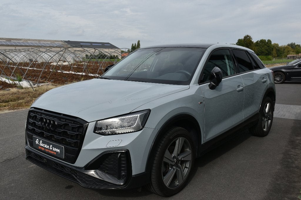 AUDI Q2 1.5 TFSI  LED / CAMERA / SPORT / NAVI / CAMERA / LED, Auto's, 1498 cc, 4 cilinders, Leder, Bedrijf